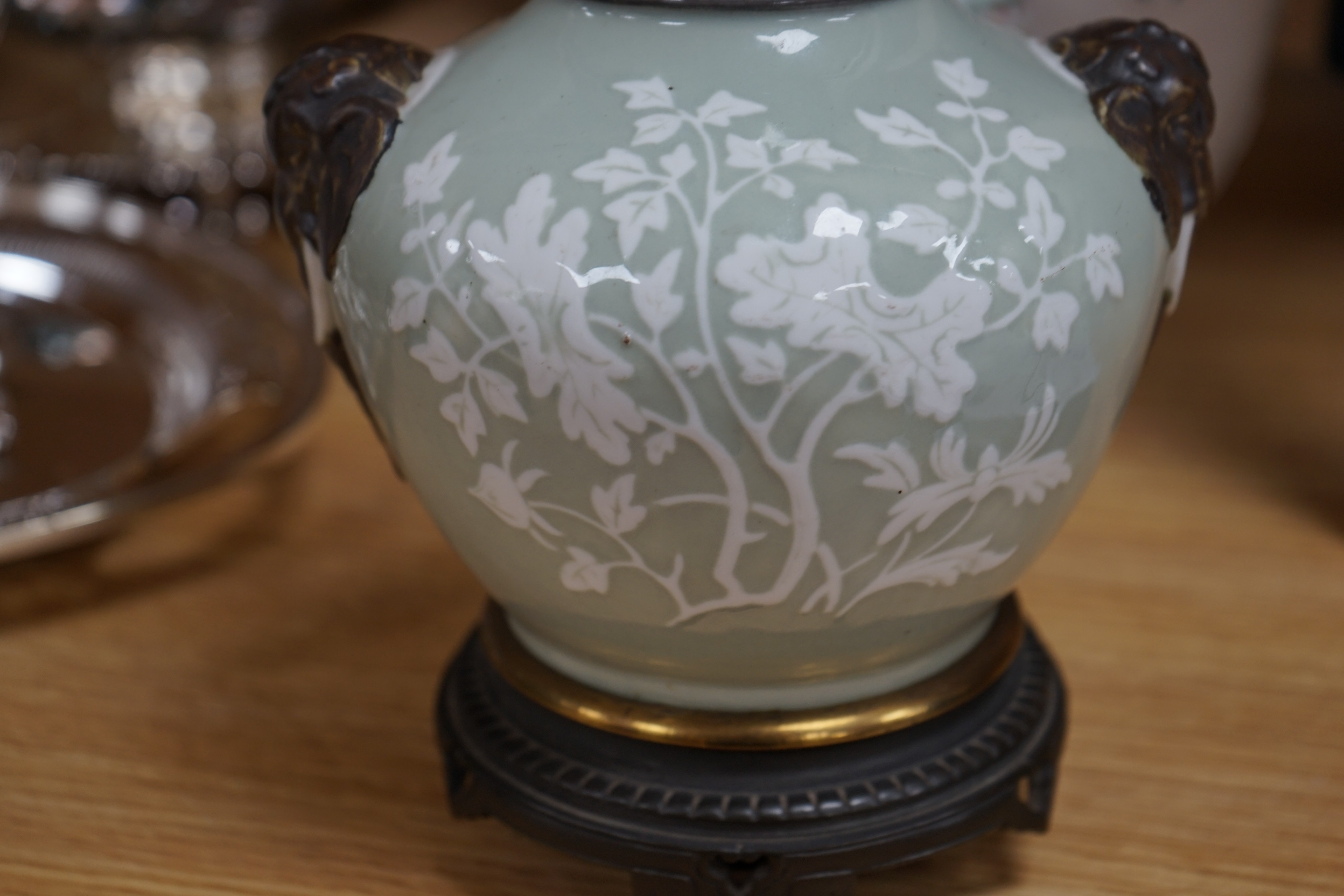 Four Chinese porcelain vases, one mounted as a lamp, 35cm